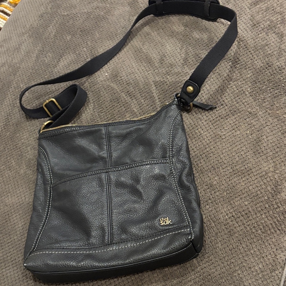 The Sak Iris Black Pebbled Leather Crossbody with Gold Accents